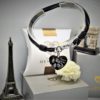 Pulsera de cuero con dije colgante corazón de acero inoxidable