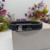 Brazalete de cuero con broche de acero inoxidable